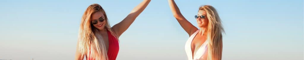 happy women on the beach